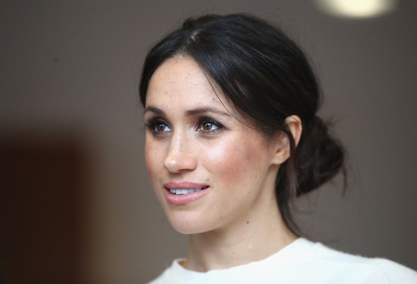 Meghan Markle poses for photo