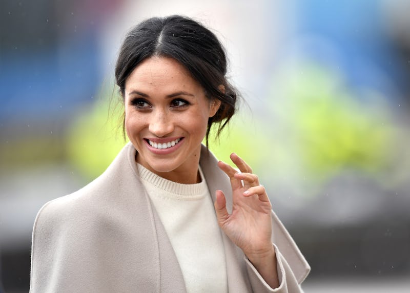 Meghan Markle waving at an appearance