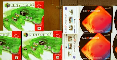 A photo of the Nintendo 64 and Sega Dreamcast selling at retail.