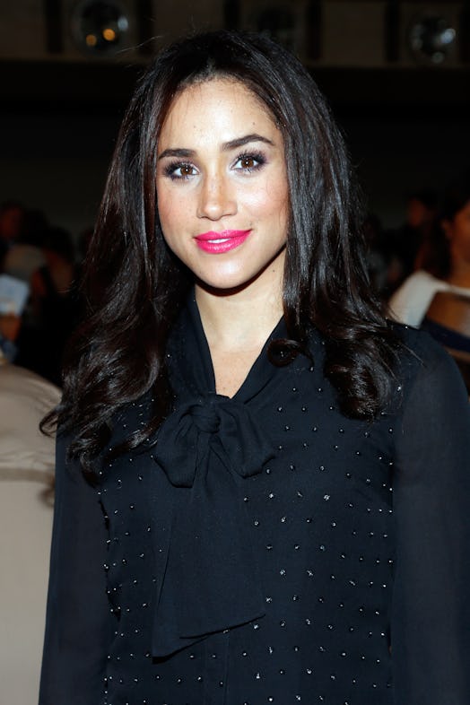 Markle's hot pink lipstick and shimmery eyeshadow made for the ultimate statement look.
