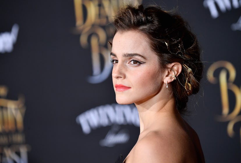 Emma Watson poses on the red carpet