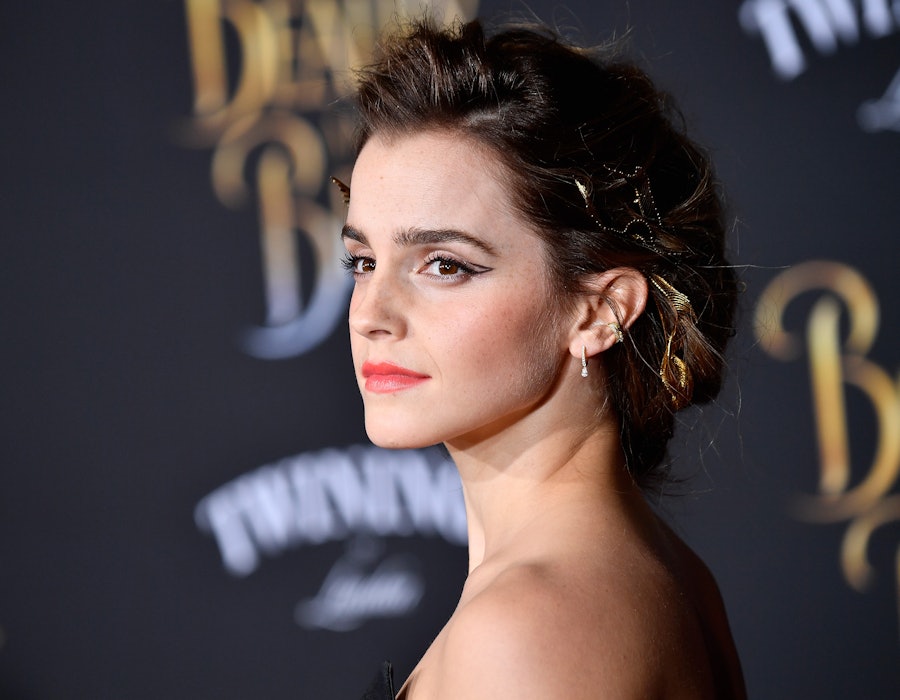 Emma Watson poses on the red carpet