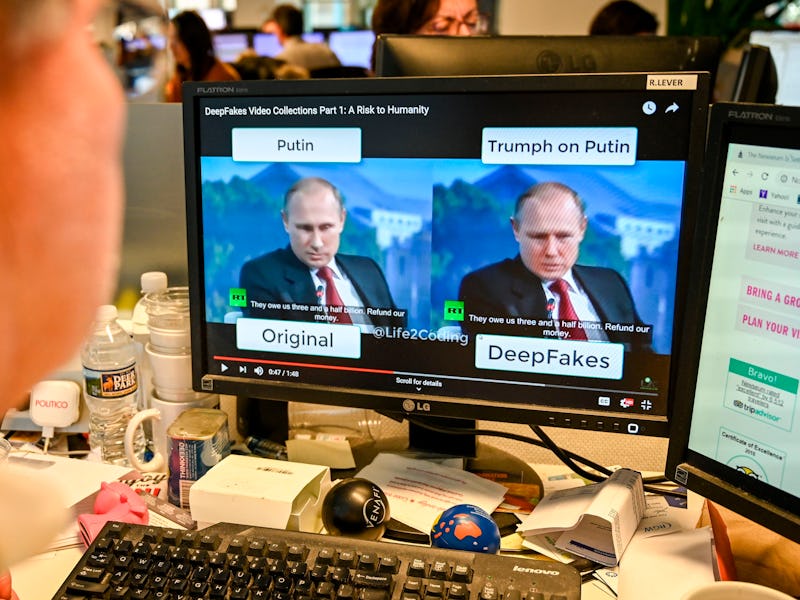 Russian leader Vladimir Putin is seen on two screens. The title above one screen reads "Putin" and i...