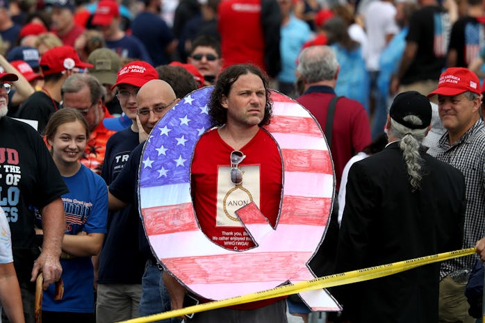 A Q Anon supporter looking like the fool they likely are