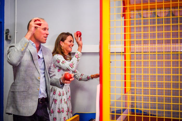 Kate Middleton and Prince William enjoyed a little arcade PDA.
