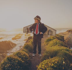 Child wearing a fake jetpack.
