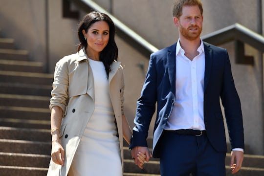 Meghan Markle and Prince Harry plant forget-me-nots with kids to honor Princess Diana.