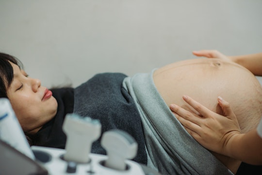Pregnant woman with Preeclampsia having an ultrasound done