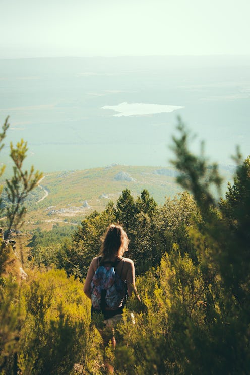A woman in a field of fall leaves. When do seasonal affective disorder symptoms start showing up? Yo...