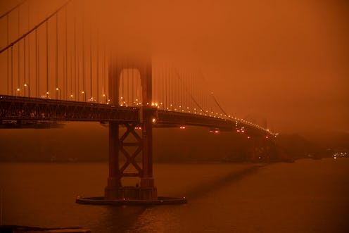 San Fransisco's Golden Gate Bridge in orange wildfire haze. Here's how to support wildfire relief ef...