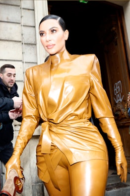 Kim Kardashian attends Kanye West's church service in Paris.
