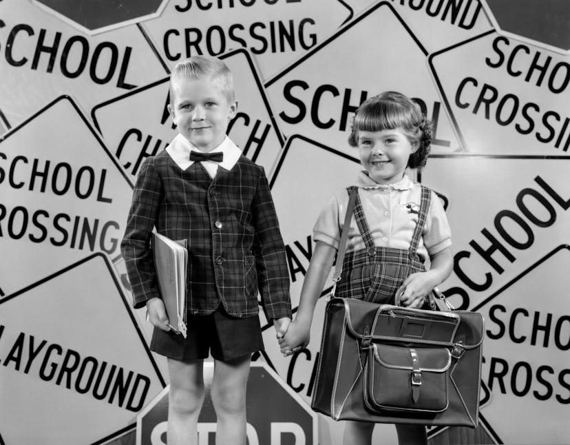 This vintage back to school photo features an adorable school-themed background.
