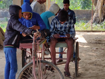 Teens in rural India playing PUBG earlier this year. 