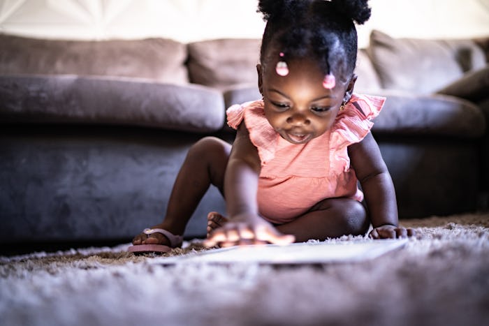 Young girl playing puzzle apps for toddlers that are actually fun