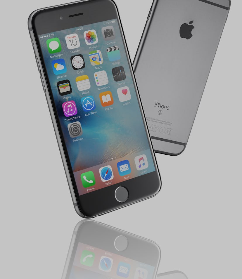 Two silver iPhones can be seen back to back.