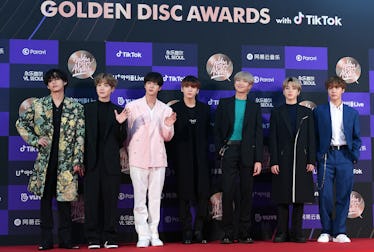 BTS attend the Golden Disc Awards.