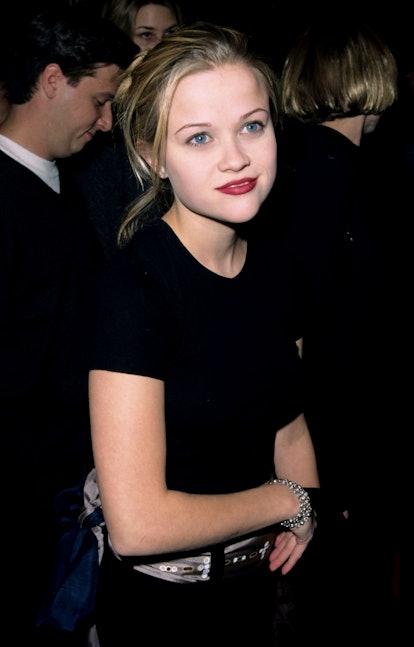 Witherspoon tested out an undone bun with a pretty red lip.