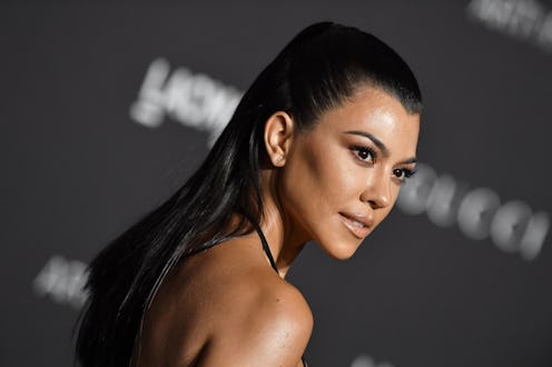 Kourtney Kardashian's nails have recently received a French manicure with a black twist.