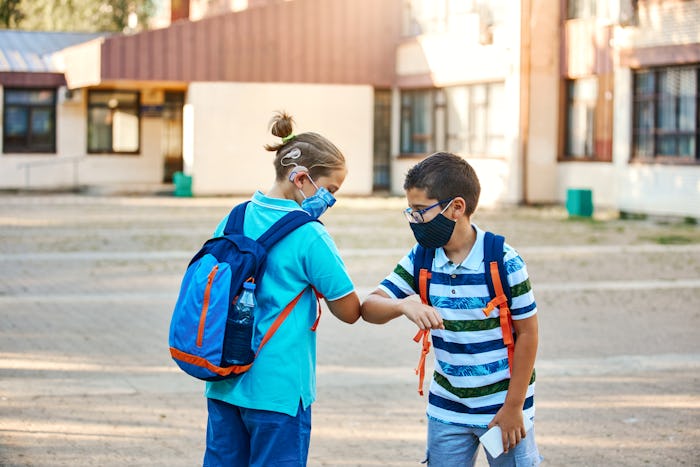 There are plenty of contact-free ways kids can greet their friends and teachers at school.