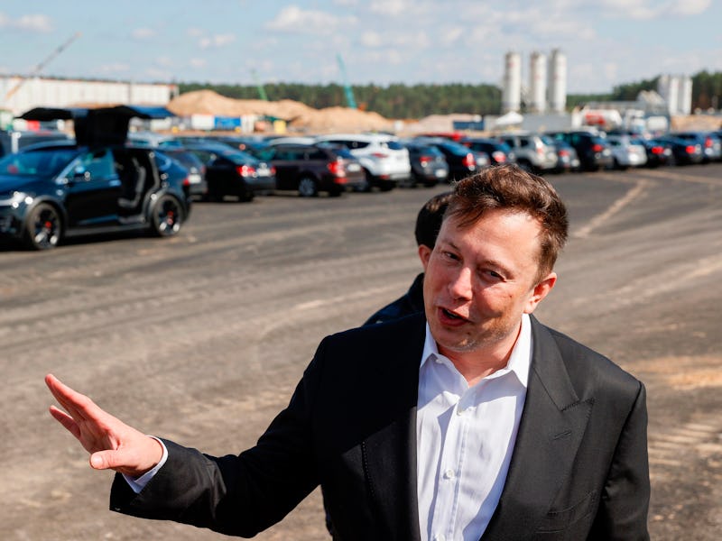 Elon Musk speaks to bystanders near Berlin, Germany.