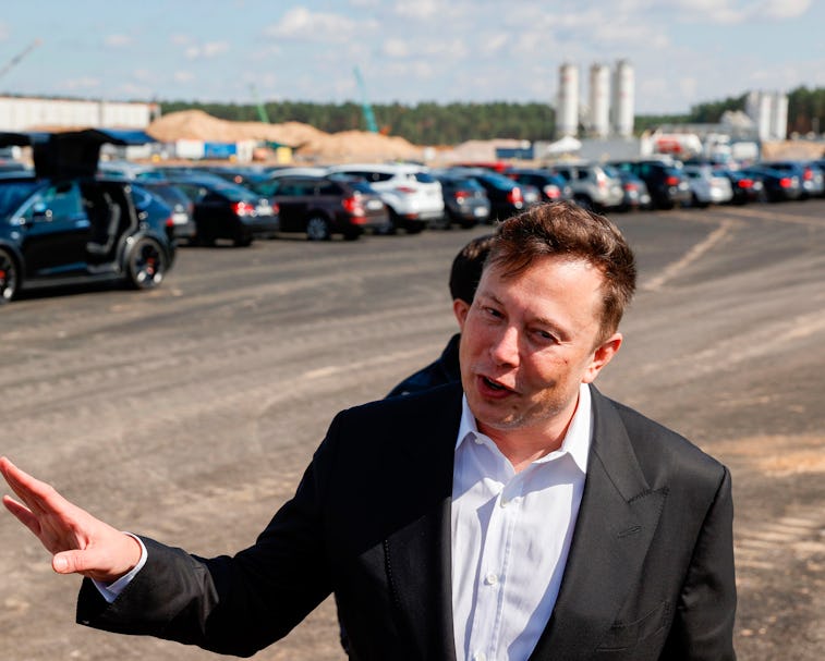 Elon Musk speaks to bystanders near Berlin, Germany.