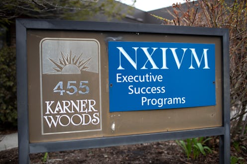 A road sign for NXIVM Executive Success Programs