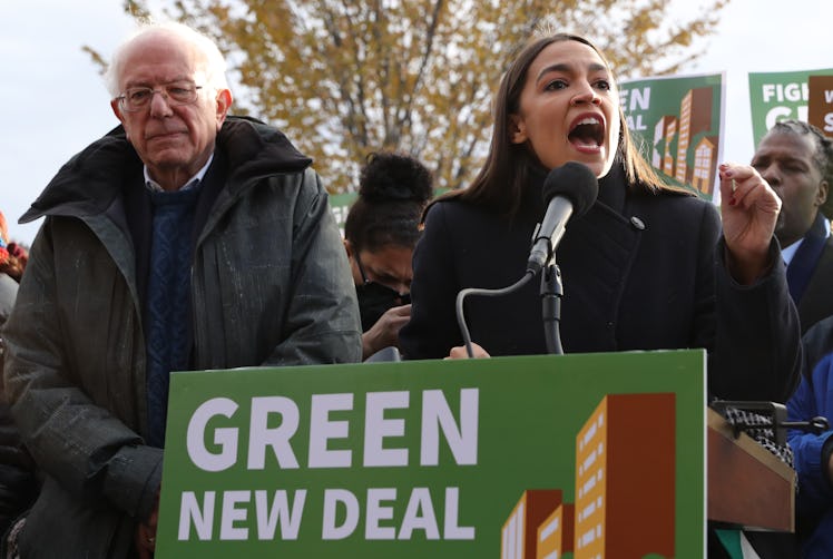Alexandria Ocasio-Cortez and Bernie Sanders promoting the Green New Deal, which Biden claimed not to...