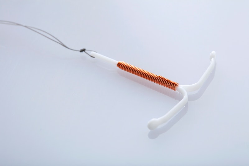 A copper IUD. Doctors explain what to know if you have to get your IUD replaced.