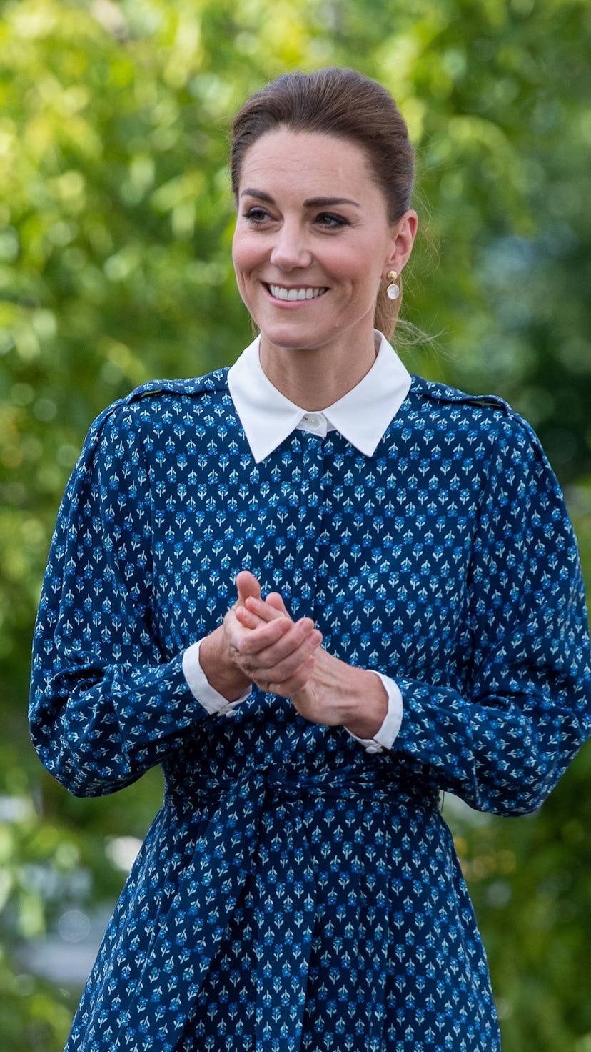 Kate Middleton posing at an event