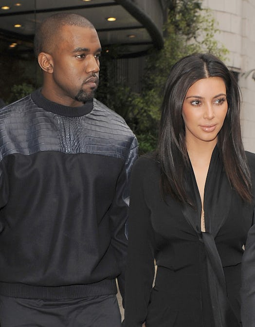 Kim Kardashian steps out with husband Kanye West. 