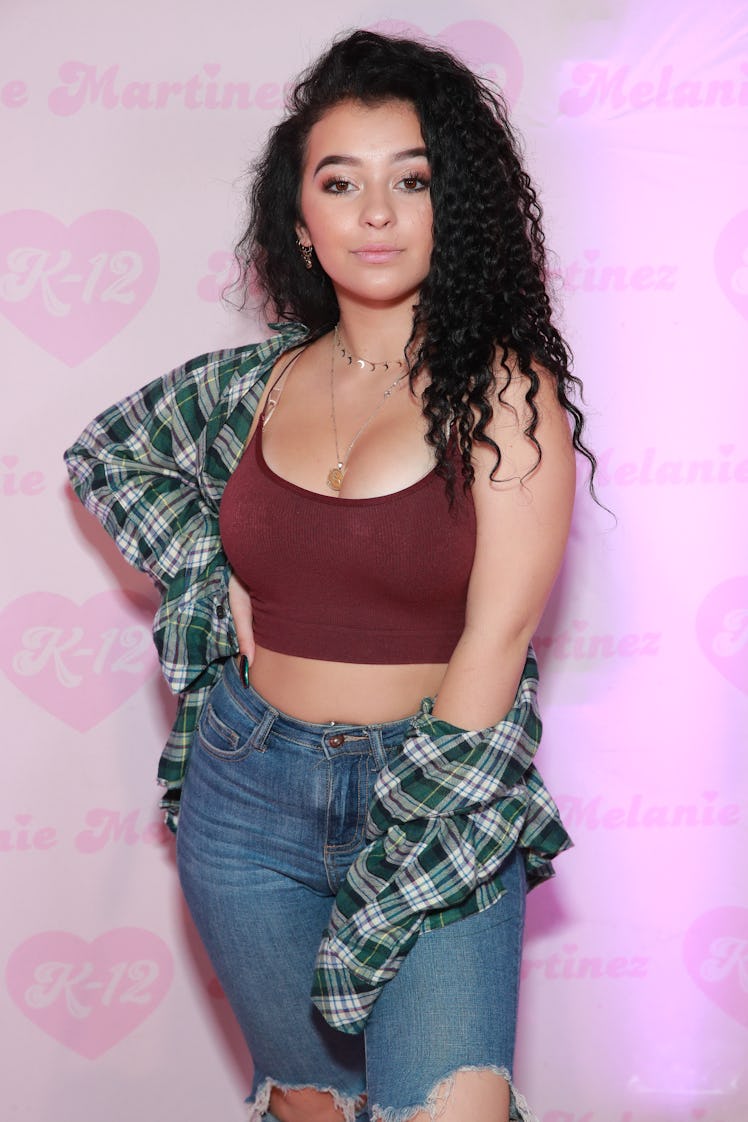 Danielle Cohn rocks a maroon crop top.