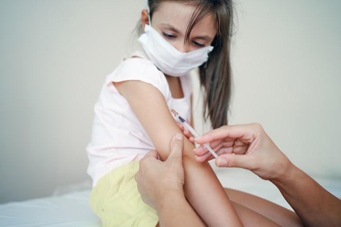 girl getting a flu shot
