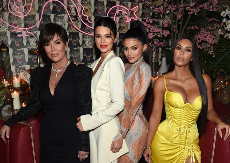Kris Jenner, Kendall Jenner, Kylie Jenner, and Kim Kardashian pose for a photo.