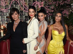 Kris Jenner, Kendall Jenner, Kylie Jenner, and Kim Kardashian pose for a photo.