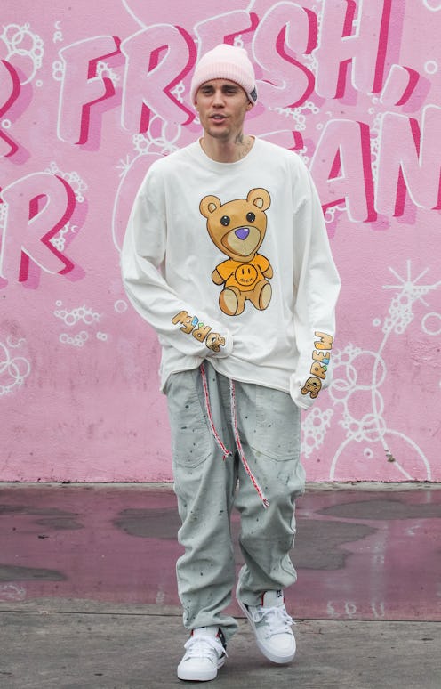 Justin Bieber's new neck tattoo adds to his large collection.