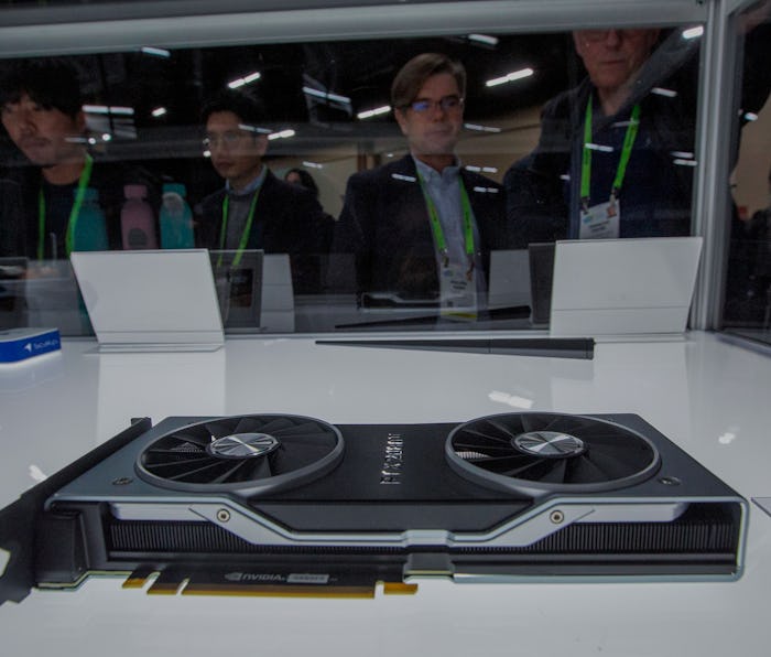 Nvidia's GeForce RTX 3080 inside a glass case at an unveiling event.
