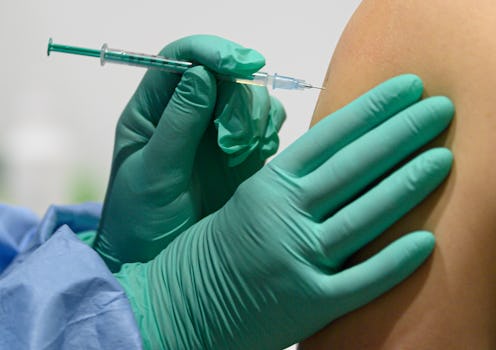 A person receives the COVID vaccine. Here's how to cope with your covid-19 vaccine side effects.