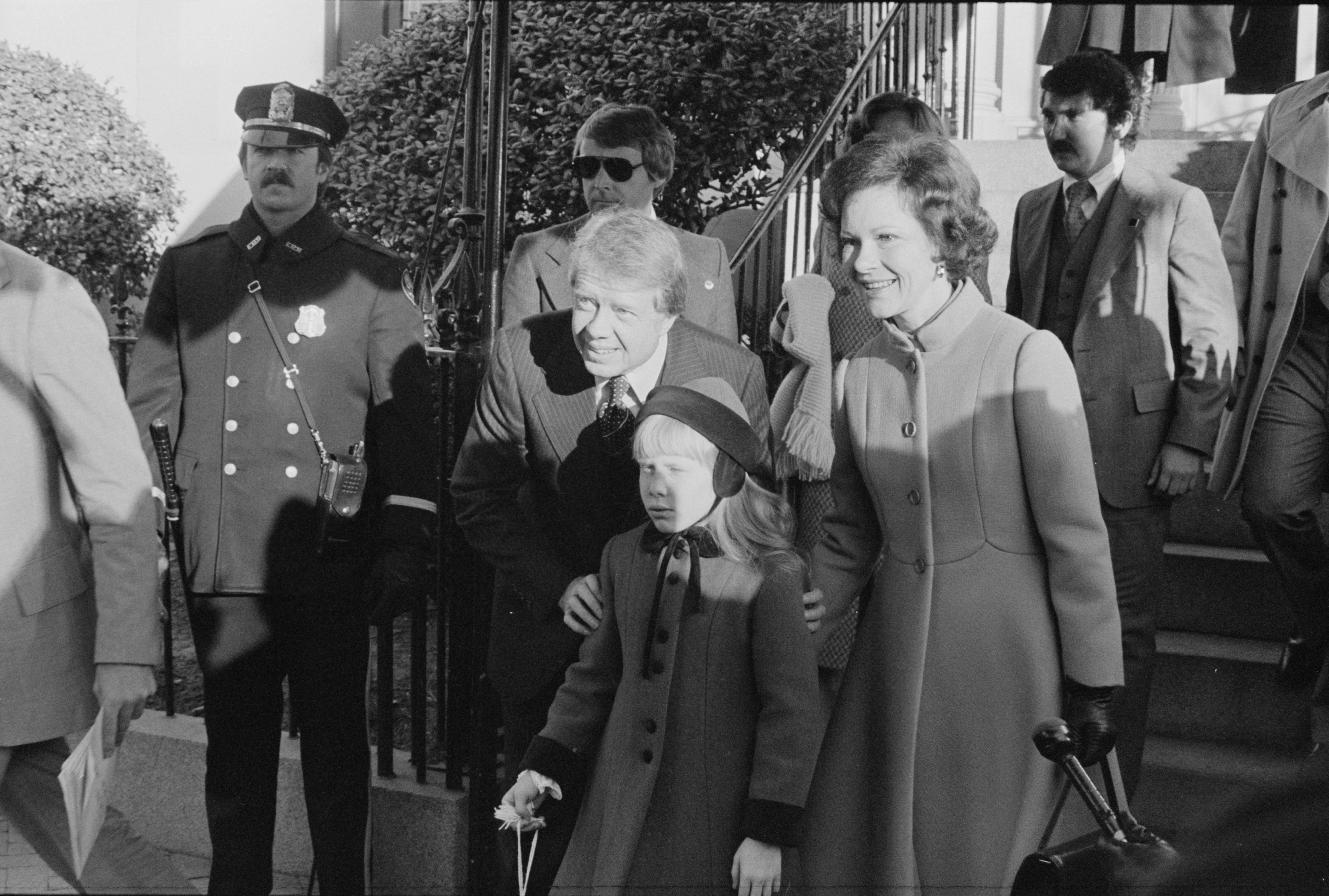 Jimmy Carter arrives to his inauguration with wife Rosalynn Carter and daughter Amy Carter.