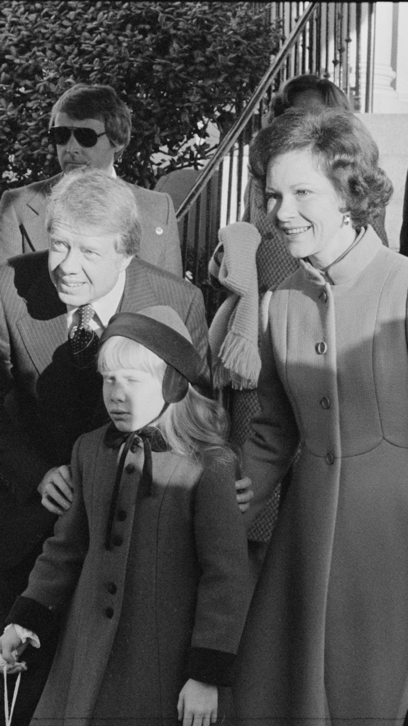 Jimmy Carter arrives to his inauguration with wife Rosalynn Carter and daughter Amy Carter.
