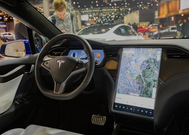 Interior of a Tesla Model X, showing its touchscreen that is prone to failure.