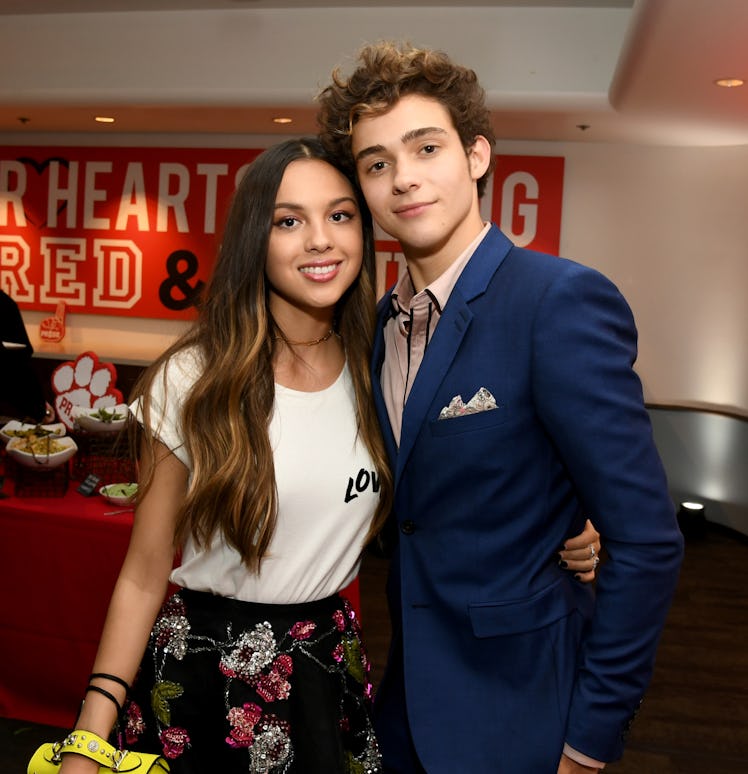Olivia Rodrigo and Joshua Bassett take a photo on-set.