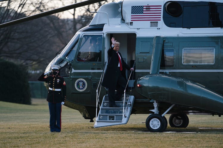 President Trump boards Marine One for the final time as he leaves the White House.