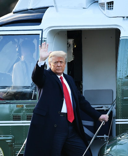 President Trump boards Marine One for the final time as he leaves the White House.