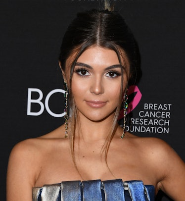 Olivia Jade hits the red carpet in a strapless dress.