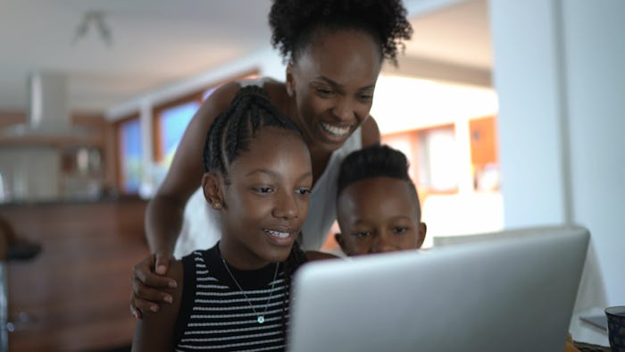 mom and kids at computer