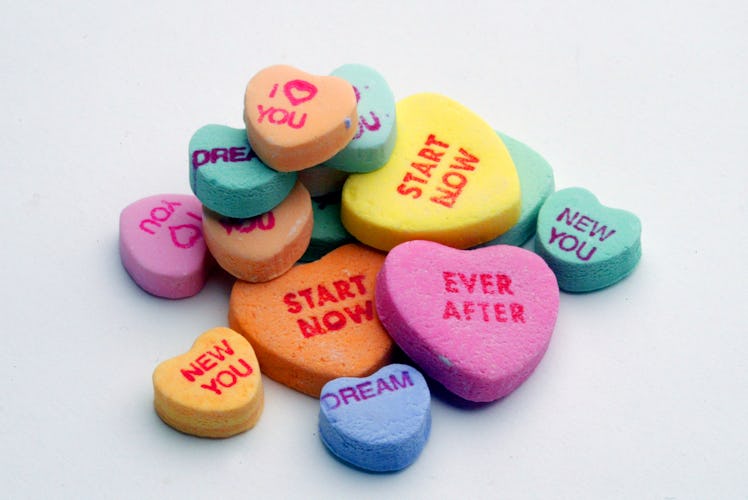 These Valentine's Day iOS 14 Home Screen ideas include florals and candy hearts.