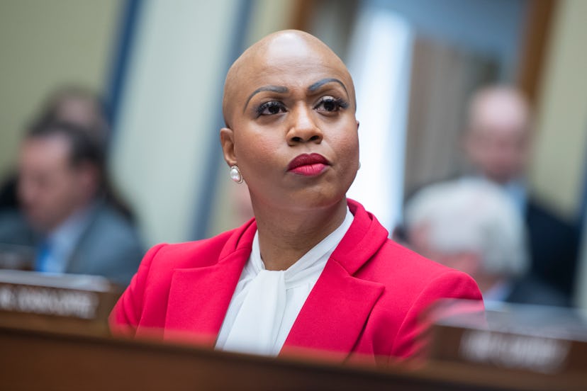  Rep. Ayanna Pressley in a white white and a pink blazer