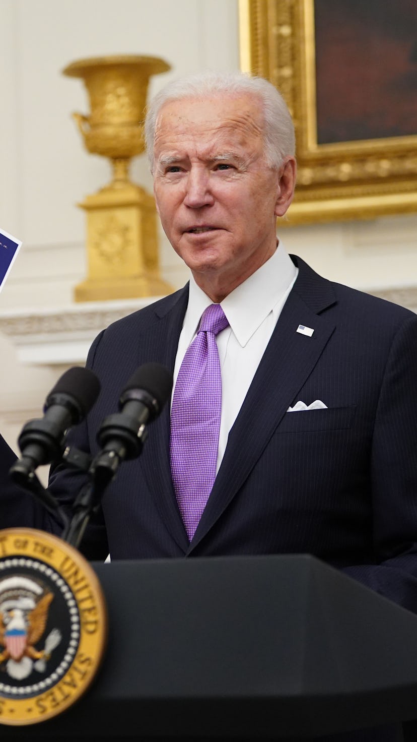 President Biden speaks while wearing a light purple tie. The Biden administration is creating new CO...