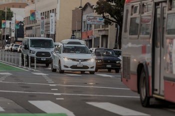 Waymo's autonomous van driving on a street in San Francisco.