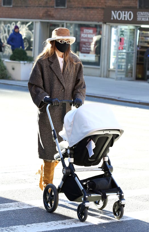 Gigi Hadid goes for a walk with her baby and a friend on January 10th, 2021 in New York City.